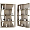 Modern Bookcase Interior Design With Decorative Sculptures Photo Frames And Small Ornaments