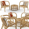 Rattan Outdoor Table With Matching Chairs And Decorative Cushions For Patio Use
