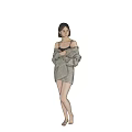 Woman in Plaid Cardigan and Shorts Standing Barefoot Against Gray Background with Hands on Outfit