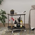 Wheeled Two Tier Side Table With Succulent Books Wine Bottles Flower Vase In Living Room