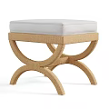 Modern Rattan Ottoman With Light Colored Cushion And Curved Cross Legs