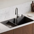 Black Double Bowl Kitchen Sink With Modern Faucet On White Stone Countertop And Wooden Cabinets