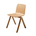 Light Wood Dining Chair With Minimalist Design Curved Backrest And Crossed Legs For Modern Interior