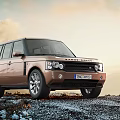 Brown Land Rover Functional SUV In Outdoor Mountainous Gravel Terrain With Natural Sky Backdrop 3d model