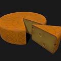 Round Patterned Cheese Wheel With Sliced Pieces Showing Interior Holes