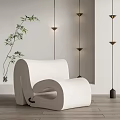 Modern White Curved Bean Bag Chair With Floor Lamps And Bamboo Plant