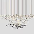 White Floral Cluster Chandelier Hanging With Gold Strings On Black Backdrop