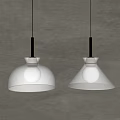 Lit Pendant Lights With Transparent Glass Shades Wooden Tops And Metal Rods Against Gray Wall