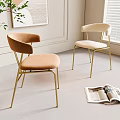 Modern Comfortable Dining Chairs With Light Brown Cushions And Golden Metal Legs