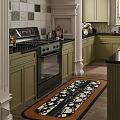 Green Kitchen Interior With Black Countertops Gas Stove Cabinets And Floral Rug