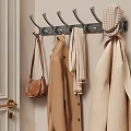 Wall Mounted Metal Hook in Entryway with Hanging Brown Bag Jacket Scarf and Hat