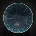 Turquoise Ceramic Bowl Featuring Intricate Decorative Patterns And Light Colored Base