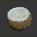 Halved Coconut With White Flesh And Brown Outer Shell On Dark Surface
