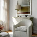 Stylish Light Colored Single Sofa With Soft Cushion Console Table And Table Lamp