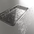 Creative Plate Decoration Showcasing Stainless Steel Tray With Splashing Water For Artistic Visuals
