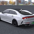 White Kia Sedan With Black Roof Black Wheels And Modern Sporty Exterior Design