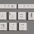 Assorted White Electrical Switches and Sockets Featuring USB Ports and Power Outlets