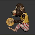Monkey Figure Sitting With Brown Fur Yellow Vest Red White Striped Pants Holding Yellow Plates