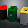 Three Colored Waste Bins With Red Green Yellow Lids For Recycling