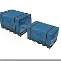 Two Blue Fabric Covered Boxes With Black Straps And Wooden Bases