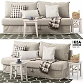 Beige Linen Two Seater Sofa With Plaid Pillows White Cushions And Plaid Blanket