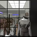 Modern Clothing Store With Mannequins And Fashion Clothing Displays In Bright Window