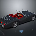 Vintage Convertible Sports Car With Black Body Red Seats And Open Top Design