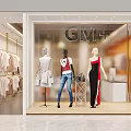 Modern Clothing Store Window Display With Mannequins In Stylish Outfits And Hanging Clothes