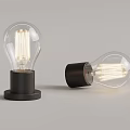 Vintage Illuminated Filament Light Bulbs With Transparent Glass And Black Base