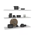 Stylish Kitchenware Display On White Shelves With Mugs Bowls Plates And Chopping Board