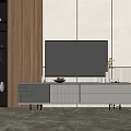 Modern TV Stand With Drawers And Cabinets In Living Room With Bookshelf Decorations And Yellow Flowers