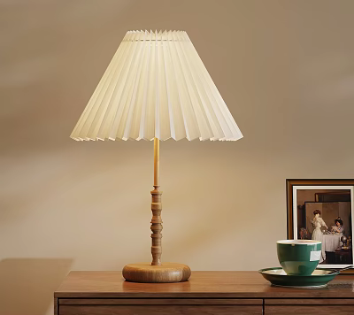 White Pleated Table Lamp With Wooden Base Green Cup And Photo Frame On Tabletop 3d model