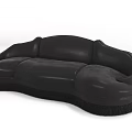 Black Leather Sectional Sofa With Modern Curved Design And Fringe Trim Base