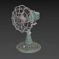 Vintage Electric Fan with Metal Cage Worn Green Base and Retro Design