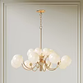 Elegant Modern Golden Chandelier With White Globe Shades For Interior Decor