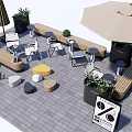 Modern Outdoor Leisure Seating Area With Umbrellas Plants Benches Tables And Tile Flooring