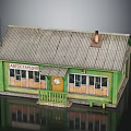 Small Green Building Model With Gray Roof Chimney Yellow Door And Windows