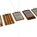 Set Of Wooden Clipboards Featuring Various Wood Grain Patterns And Metal Clips