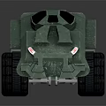 Green Armored Military Vehicle Toy Model With Large Wheels And Red Rims Front Design
