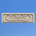 Intricate Carved Lotus Design On Decorative Stone Panel Against Blue Sky