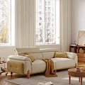 Comfortable Modern Double Sofa With Yellow Pillows And Brown Throw Blanket In Bright Living Room