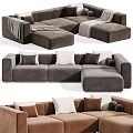 Modern Modular Sectional Sofa With Pillows And Throw Blankets In Neutral Tones For Living Room