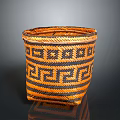 Stylish Woven Storage Basket with Orange and Black Geometric Pattern Design