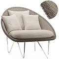 Modern Wicker Leisure Chair With Beige Cushions And Silver Metal Legs