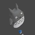 Gray Totoro Character With Pointed Ears White Belly And Small Blue Figure