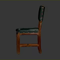 Classic Green Leather Chair With Wooden Frame And Golden Emblem On Backrest