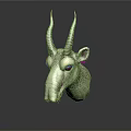 Green Fantasy Creature Head Sculpture With Red Spiral Horns And Purple Red Stripes