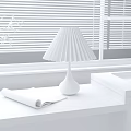 Table Lamp With Pleated Lampshade Black Base On Windowsill With Magazine Green Plants And Blinds