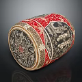 Traditional Cylindrical Stool With Red Black Intricate Patterns And Ornate Decorative Designs