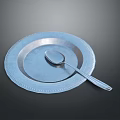 Blue Plate With Decorative Edge And Silver Spoon For Daily Household Use
